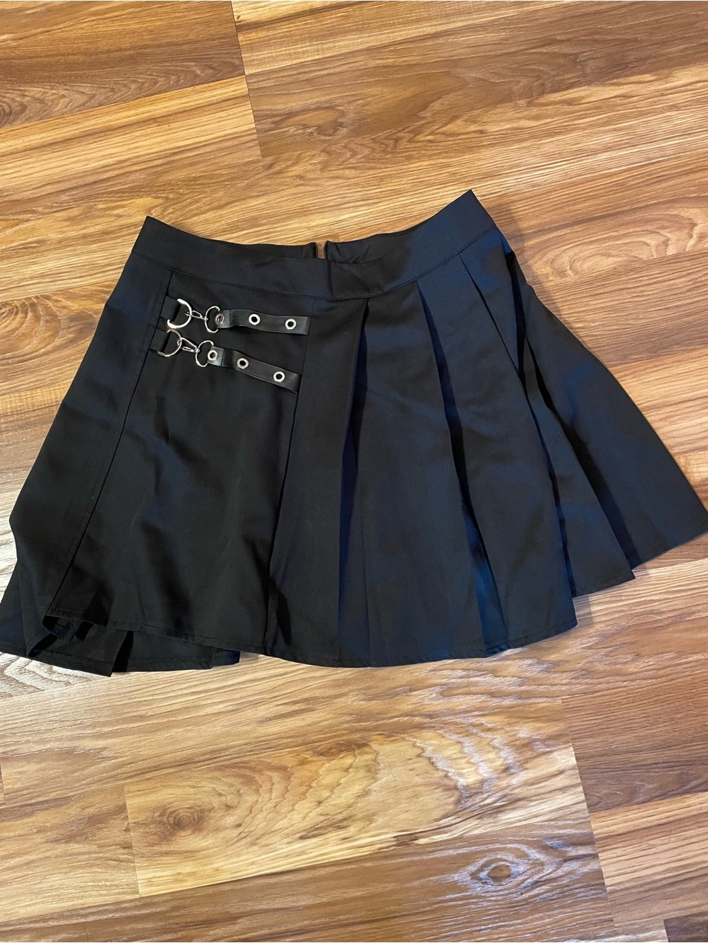 Black Pleated Mini Skirt with Buckle Detail